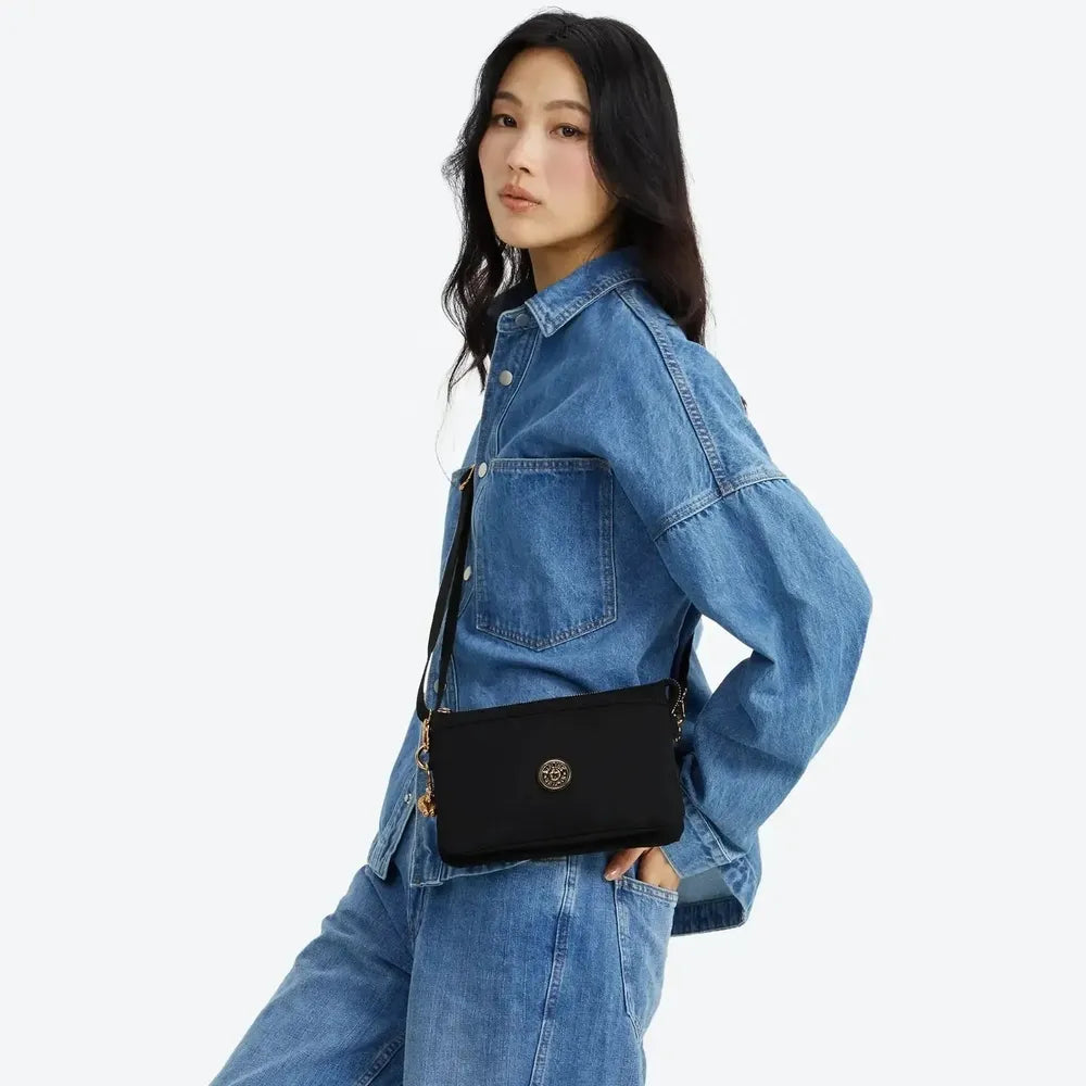 Kipling RIRI crossbody-veske Blush Gold Black-Veske-BagBrokers
