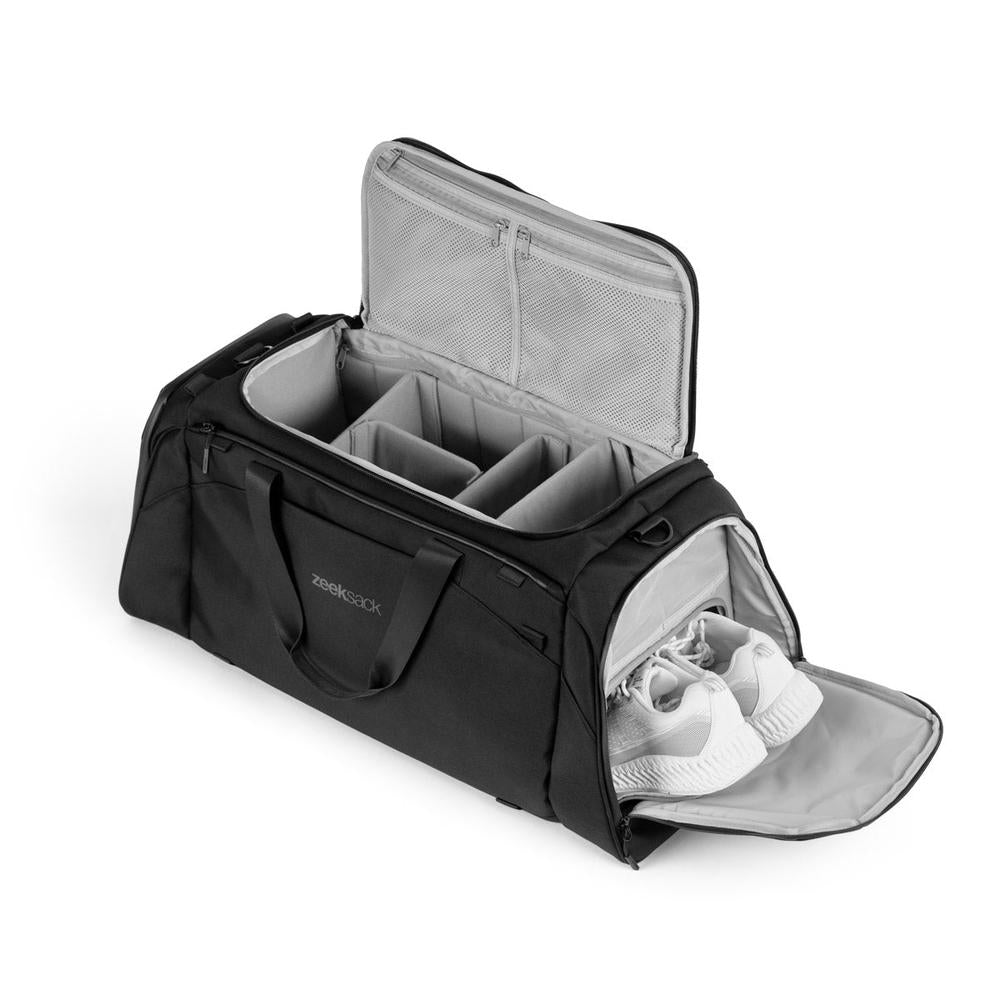 The Duffelbag åpen med skillevegger og organisering